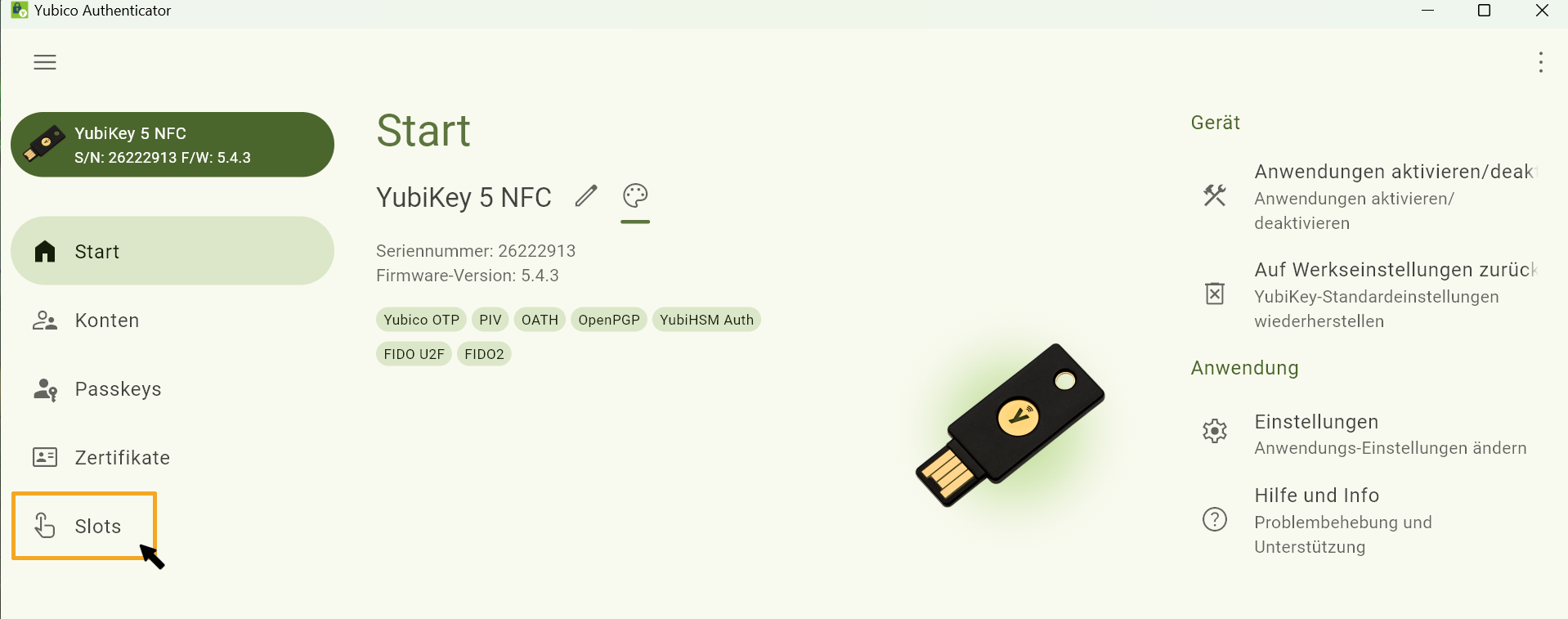 Screenshot des Yubico Authenticators. Der Button “Slots” zur Einrichtung des Schlüssels befindet sich in einer unter „Start, Konten, Passkeys und Zertifikate“ in einer Menüauswahl..