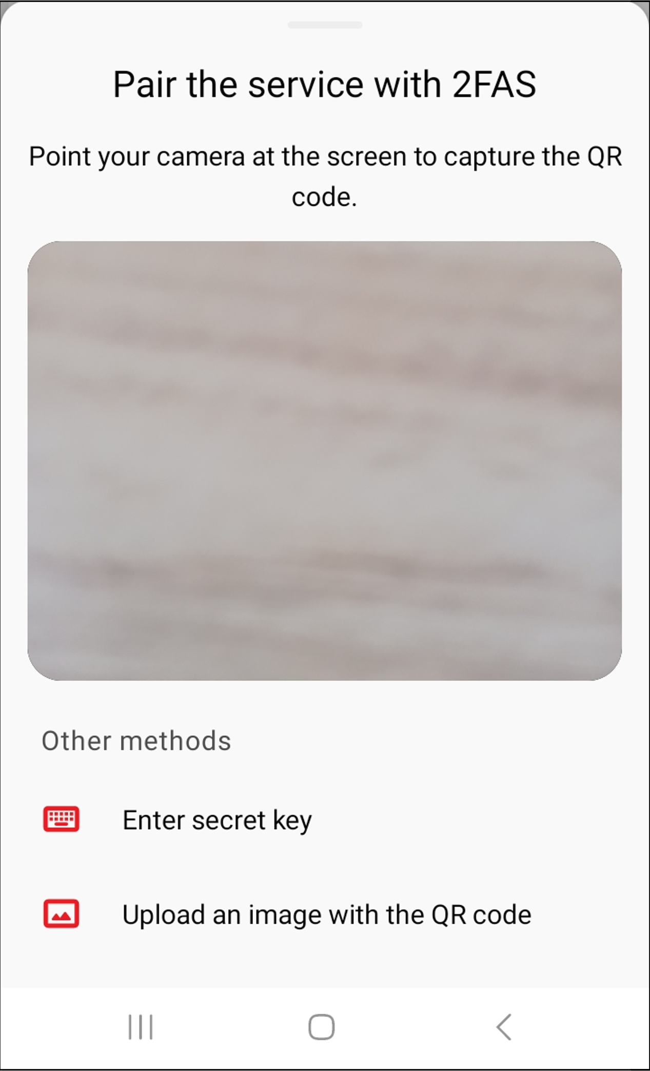 Screenshot of the 2FAS authenticator app. The camera is open. Under "Other method" you will find the "Enter secret key" option.