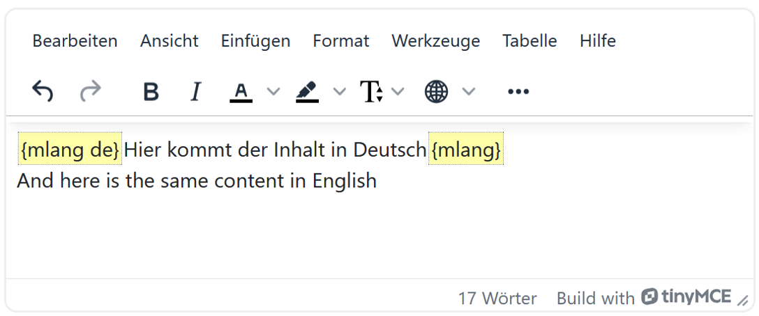 Screenshot eines Text-Editors mit einer Menüleiste und einer Symbolleiste. Im Textfeld steht: "{mlang de} Hier kommt der Inhalt in Deutsch {mlang}" (die Sprachtags "{mlang de}" wurden  "{mlang}" automatisch hinzugefügt und sind gelb hervorgehoben). Darunter steht: "And here is the same content in English". Hier sind noch  keine Sprachtags hinzugefügt.